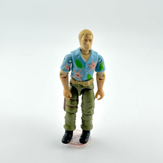 Action figure with a blue shirt and green pants on a white background