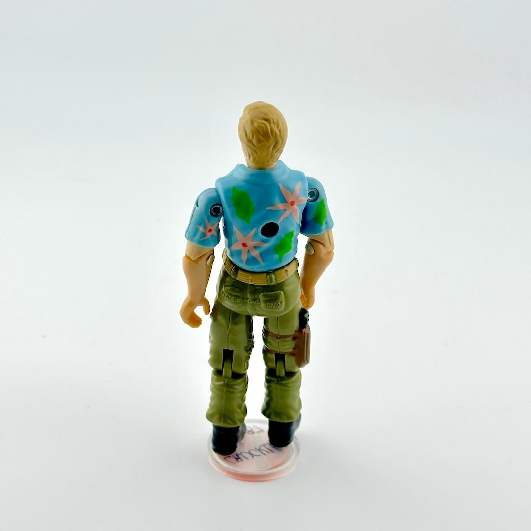 Action figure with a blue shirt and green pants on a white background