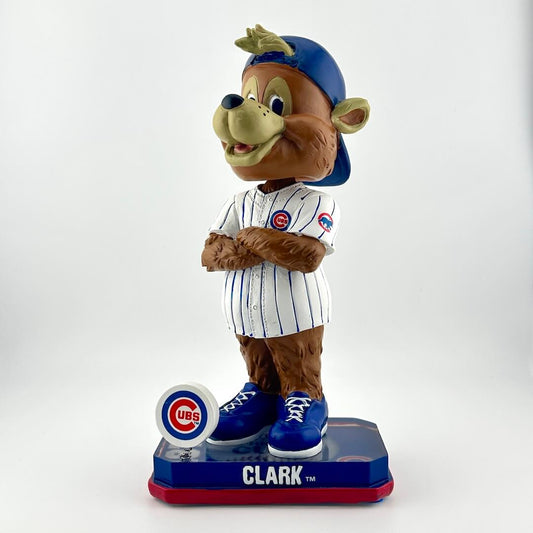 Bobblehead of a bear mascot in a Chicago Cubs uniform on a white background