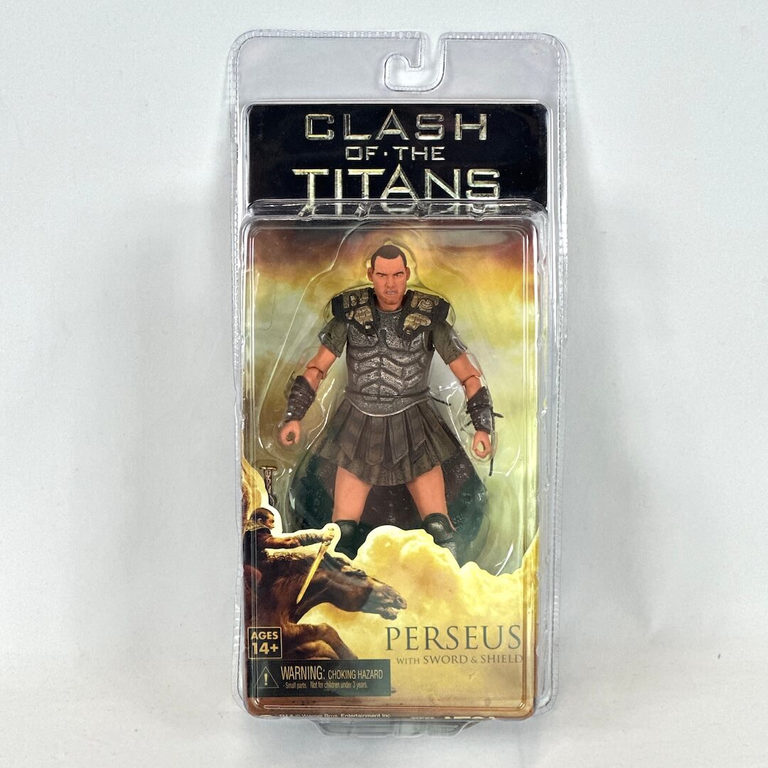 Toy figure of Perseus from 'Clash of the Titans' in packaging on a white background