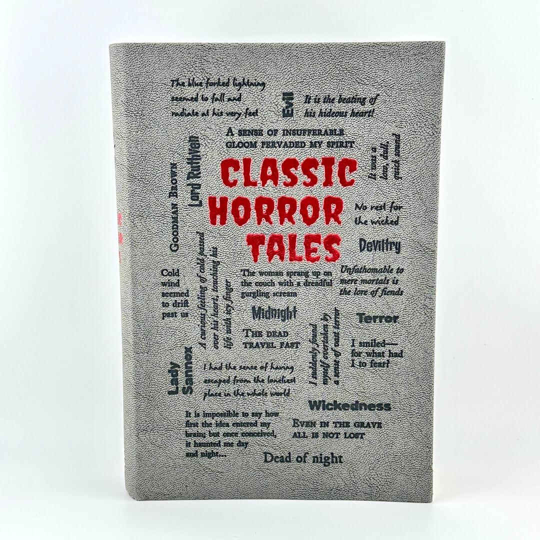 Book titled 'Classic Horror Tales' with text design on a gray background