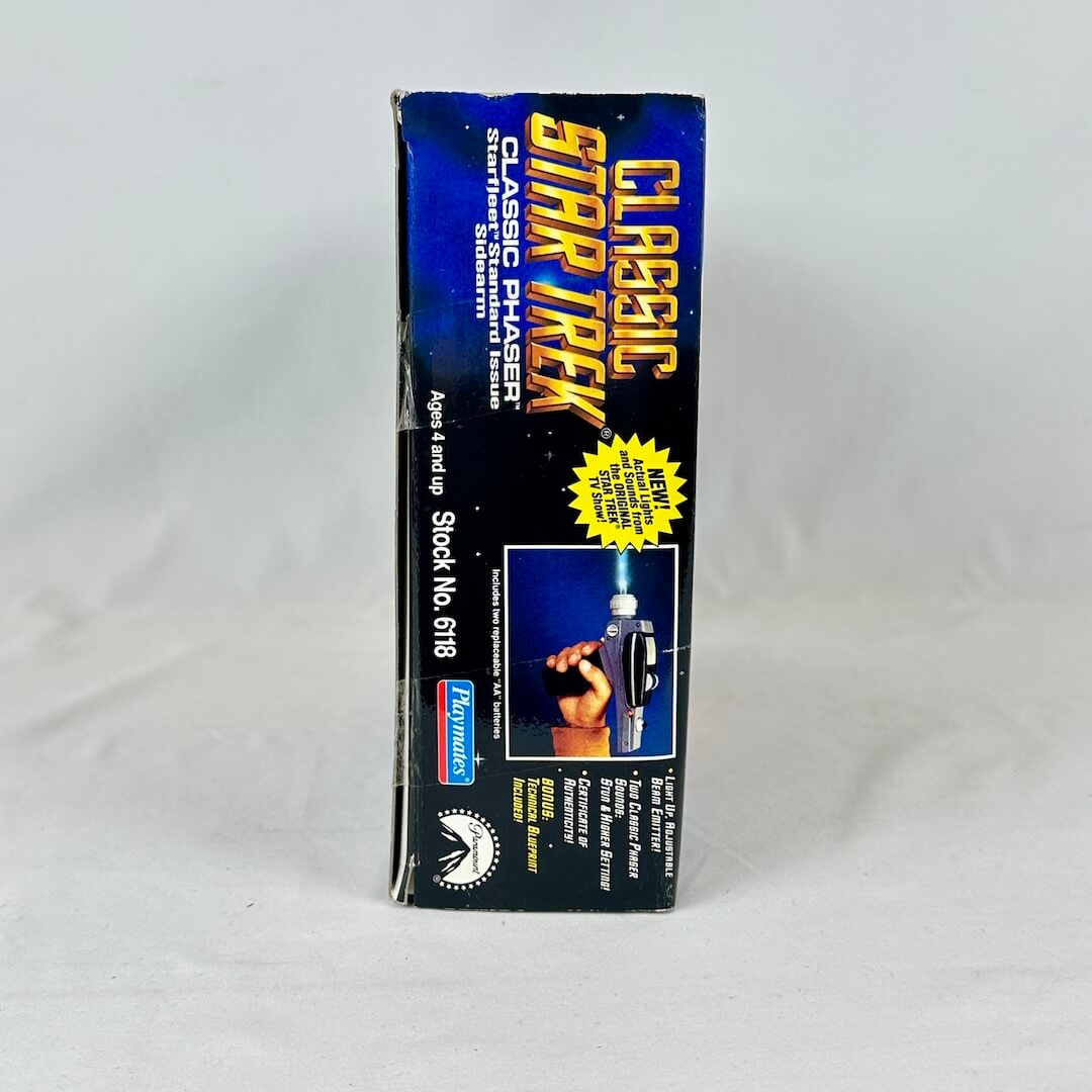 Side view of box to show shelf wear and broken seal.