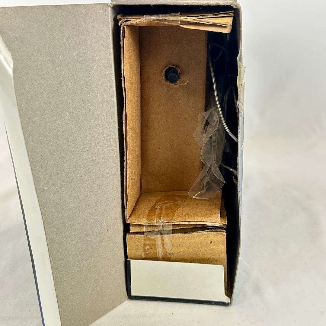 Interior of box showing all original packaging. 