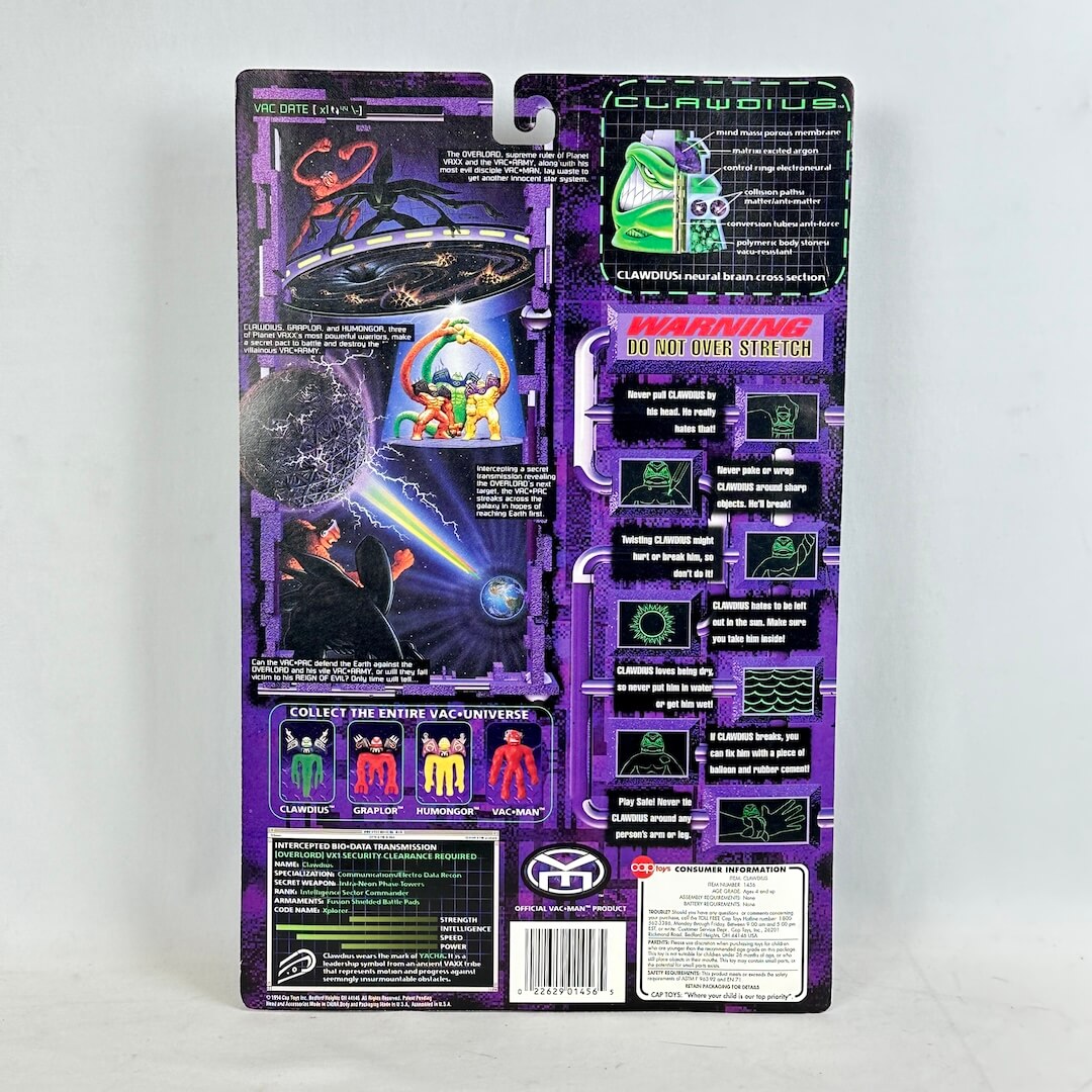 Back view of a toy action figure packaging with purple and black design