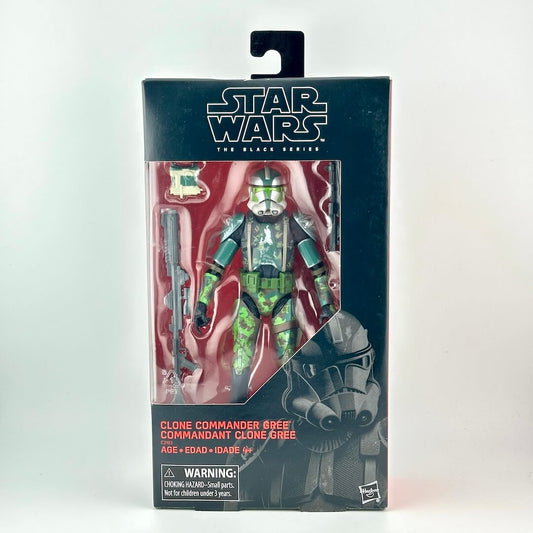 Star Wars action figure in its original window packaging featuring figure in green armor with accessories. 