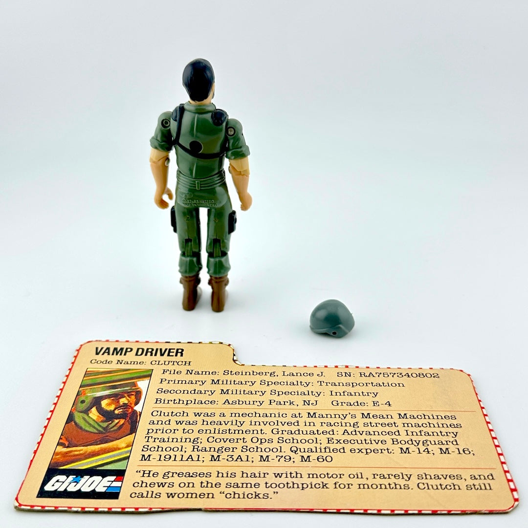 GI Joe action figure with character card and accessory against white background. 