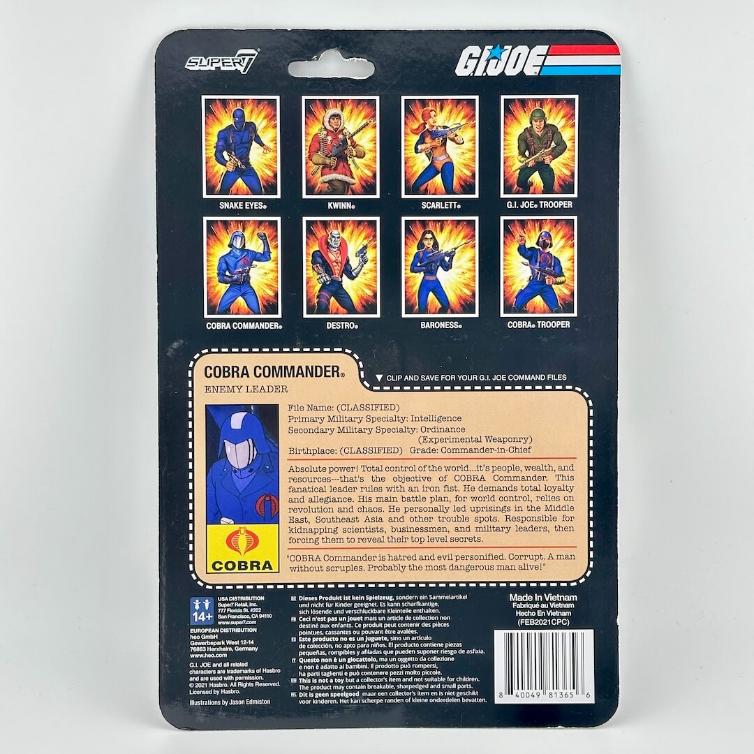 Back of action figure packaging with other character images and figure profile against white background.