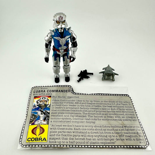 Action figure of Cobra Commander with accessories and character card on a white background
