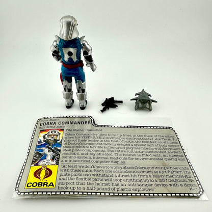 Toy figure of a Cobra Commander with accessories and character card on a white background