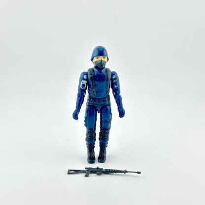 GI Joe Cobra action figure with weapon against white background.