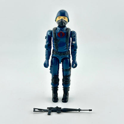 Action figure in blue and black costume with helmet and mask on a white background