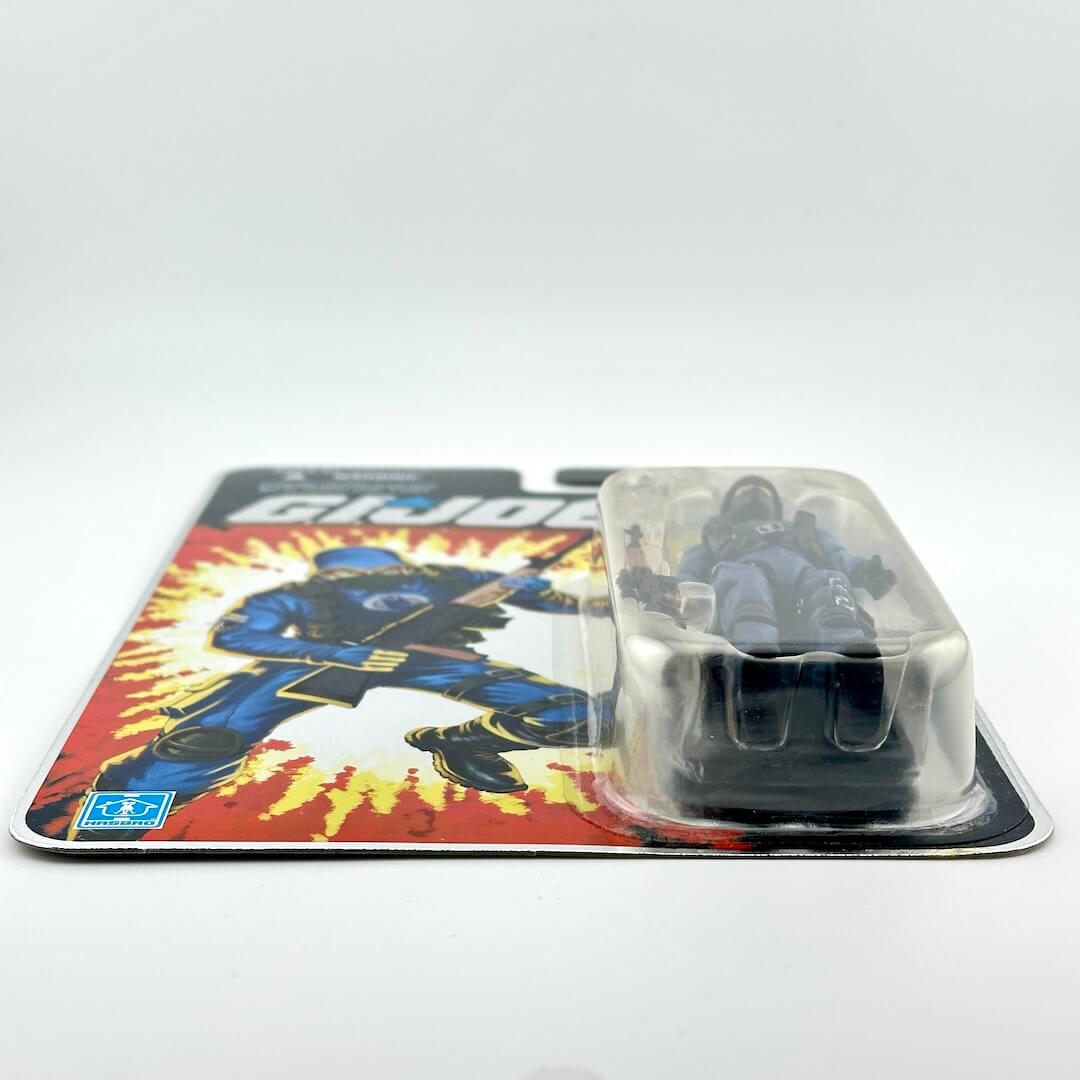 GI Joe action figure in packaging against white background. 