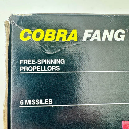 Vintage packaging for 'Cobra Fang' with text about free-spinning propellers and missiles.