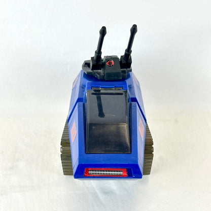 Frontal view of blue and black toy tank with stickers on white background. 