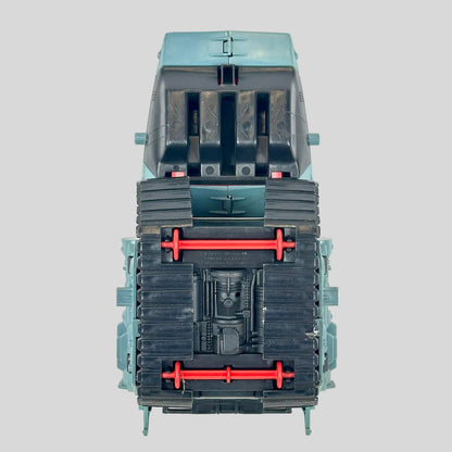 Vintage toy tank with red accents and green-gray body. 