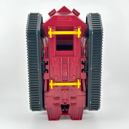 Red toy vehicle with black wheels and yellow axles on a white background