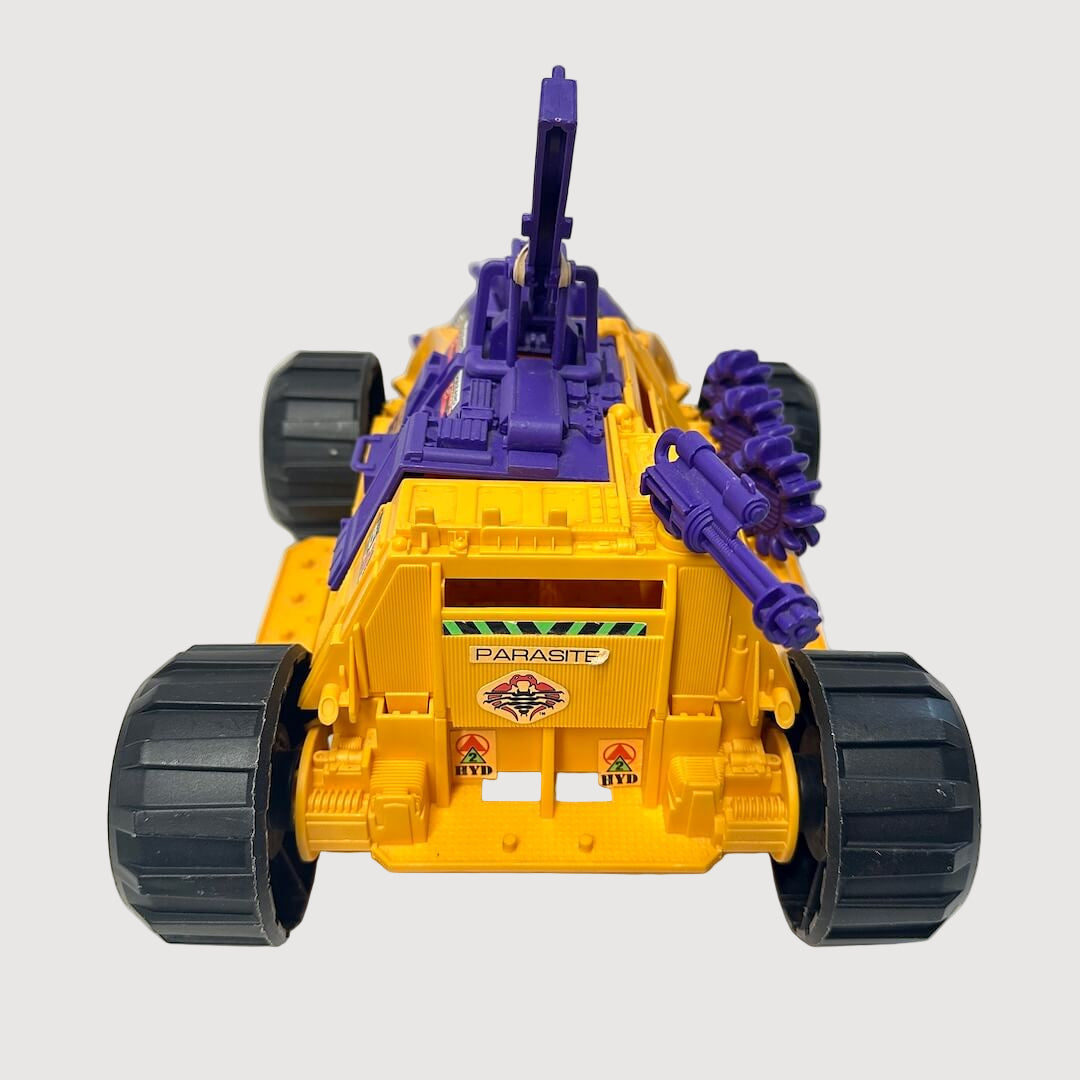 Orange tank-like vehicle with purple accents and gun against white background.
