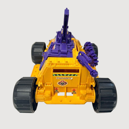 Orange tank-like vehicle with purple accents and gun against white background.