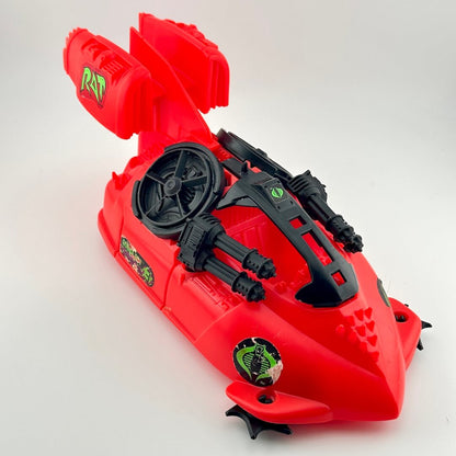 Red and black toy vehicle against white background. 