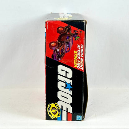 Vintage toy car packaging with 'Cobra' branding on a white background
