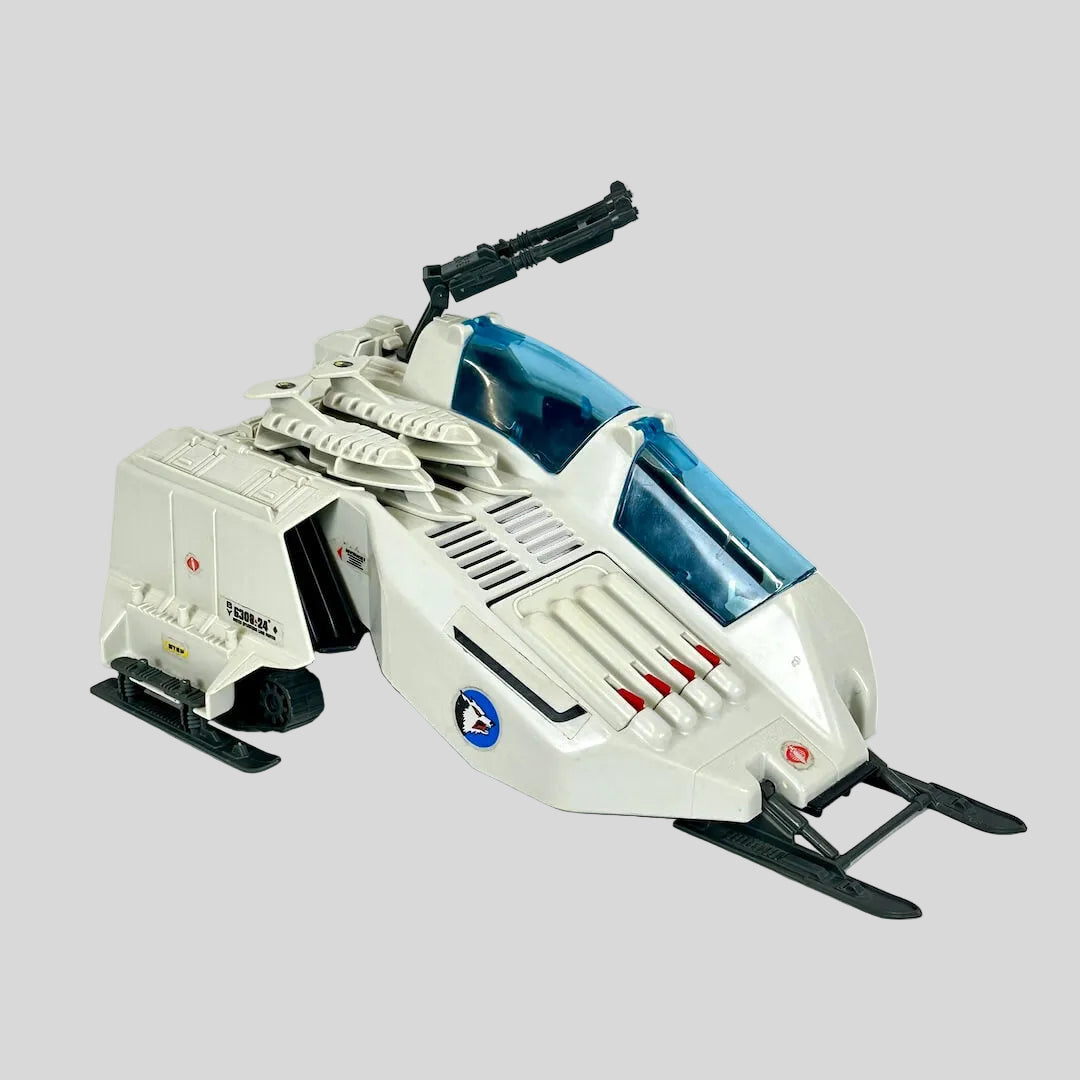 Toy snow vehicle with a white and blue design on a light gray background