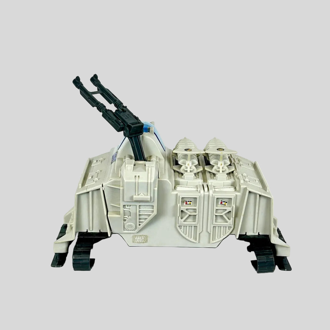 Toy vehicle with a white and black color scheme on a light gray background