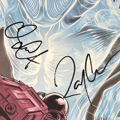 close up of two marker signatures on front of poster at center of poster.