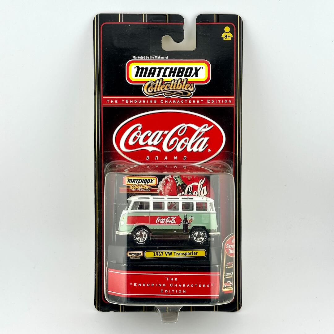 Matchbox Collectibles Coca-Cola branded diecast car of a vintage VW Transporter, in its original blister card packaging.