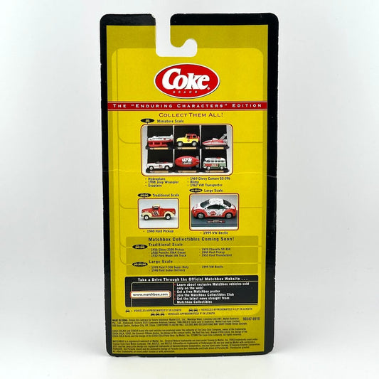 The back of a vintage 1:24 scale model car package featuring Coca-Cola branding and character art.