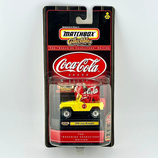 Matchbox Collectibles Coca-Cola 1998 Jeep Wrangler die-cast toy car in its original blister packaging.