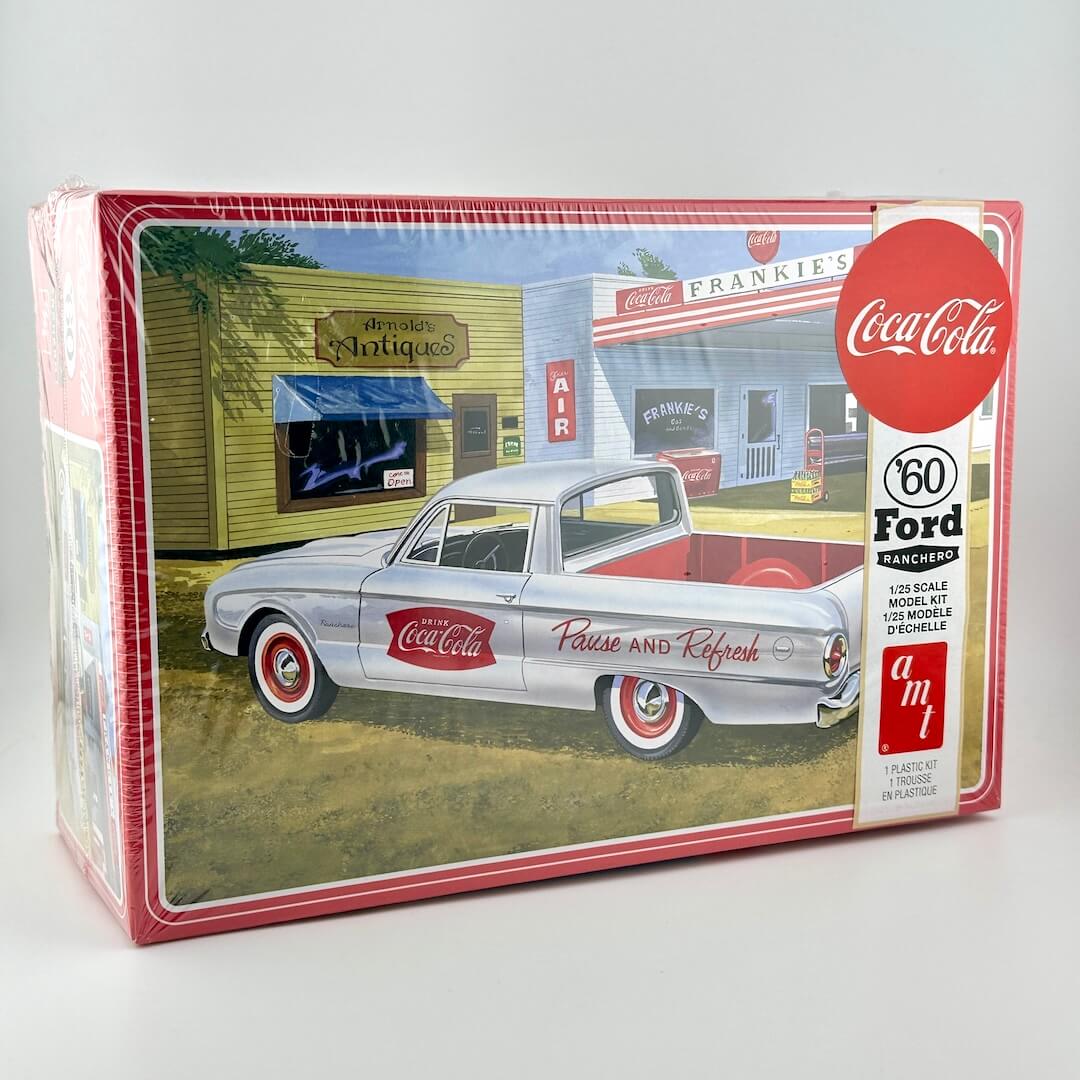 Model car kit box featuring a 1960 Ford with Coca-Cola branding on a white background