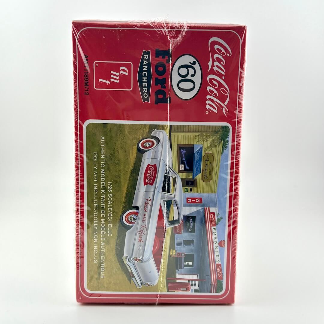 Model car kit packaging featuring Ford and Coca-Cola branding on a white background