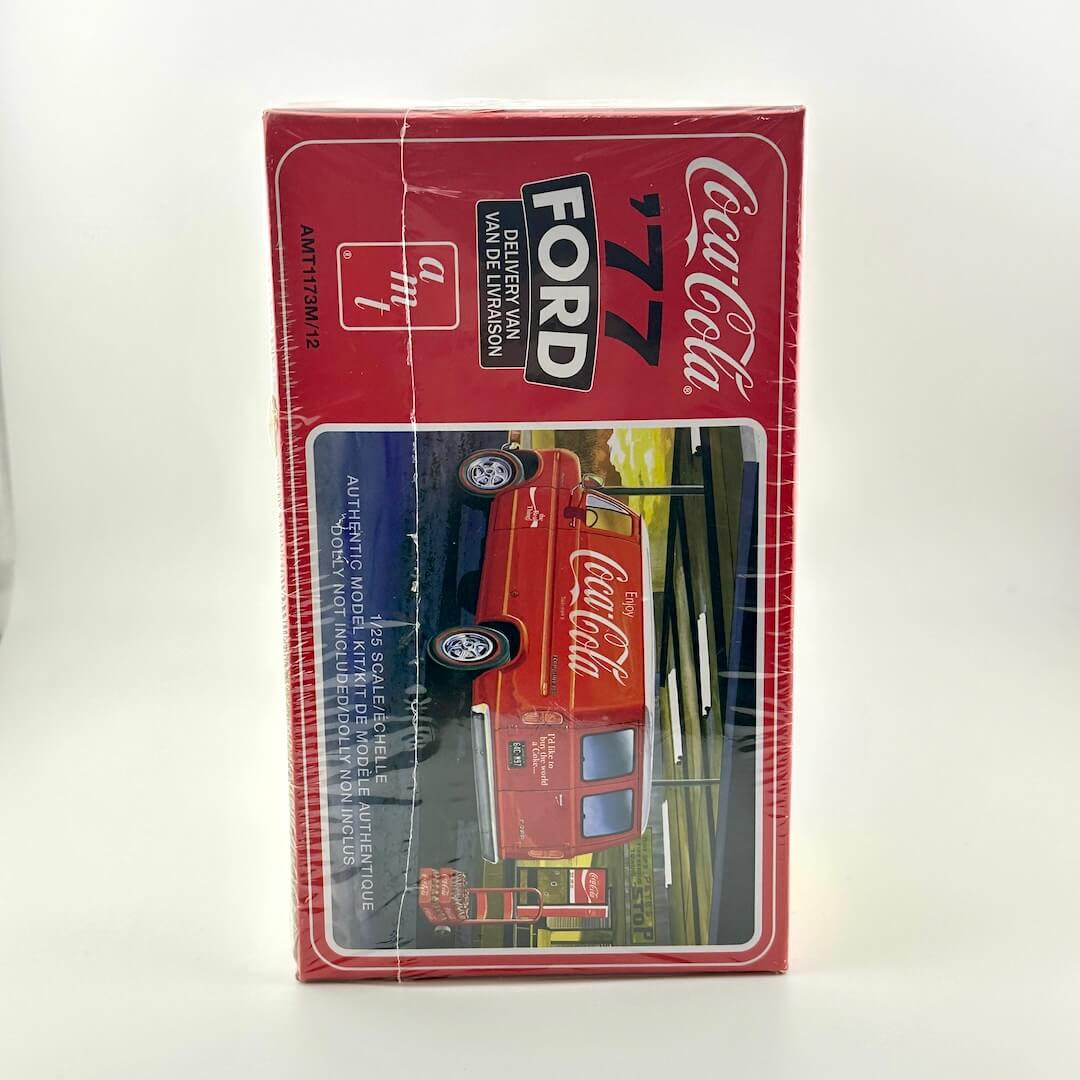 Model car kit packaging featuring a red Coca-Cola Ford truck on a white background