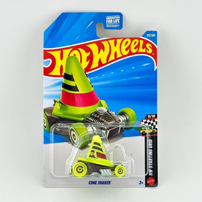A Hot Wheels 'Cone Shaker' toy car in its original blister packaging, featuring a lime green and red cone-shaped car.