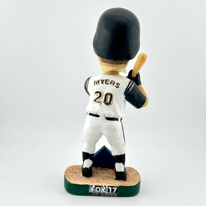 Baseball bobblehead figure with a white uniform and black helmet on a white background