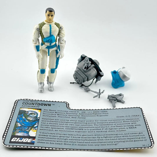 GI Joe action figure with accessories and character card on a white background