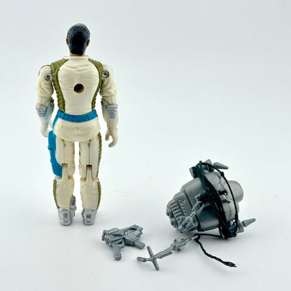 GI Joe action figure with accessories on white background. 
