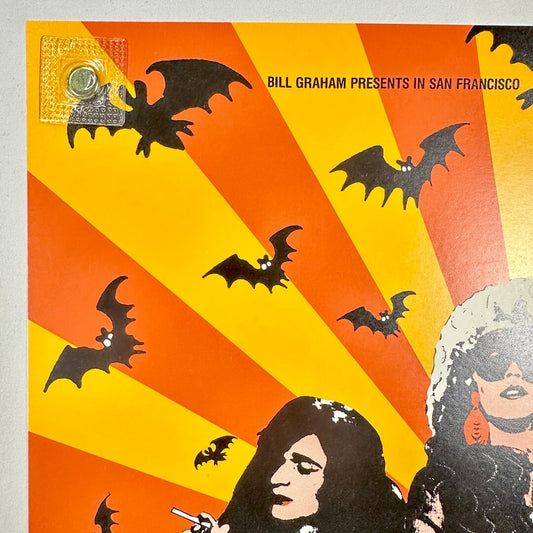 Top left corner of poster with clean edges and crisp corner. 