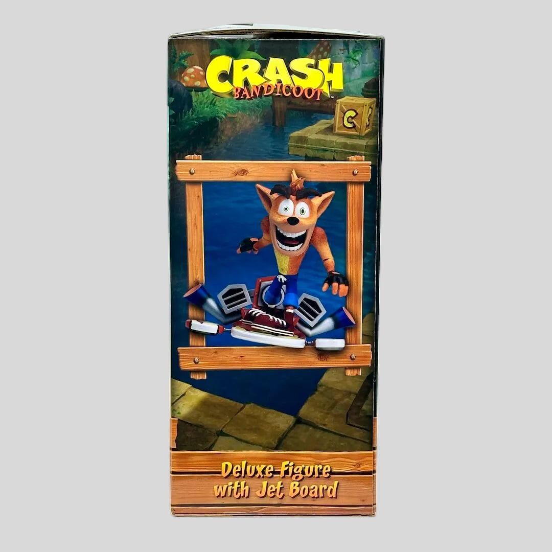 Boxed figure of Crash Bandicoot with jet board on a white background