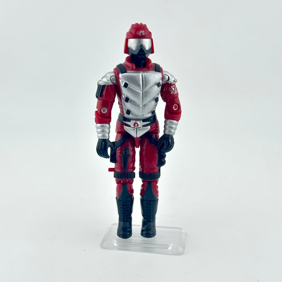 Action figure in red and black suit on a white background