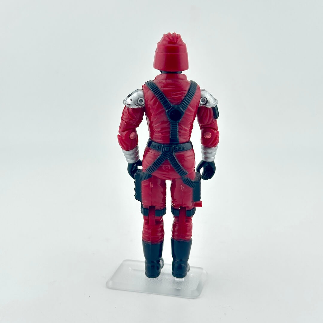 Red superhero action figure on a white background