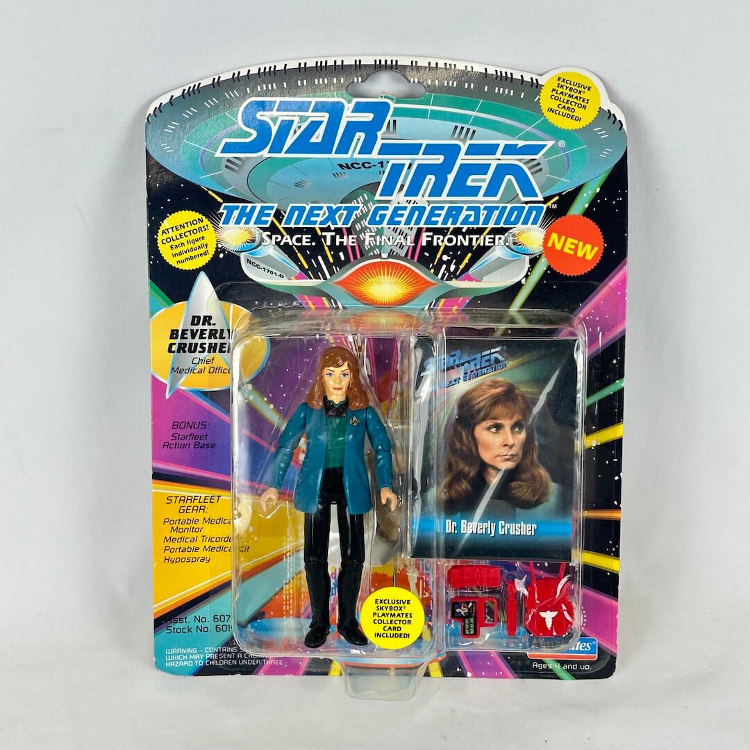 Beverly Crusher action figure in packaging against white background.