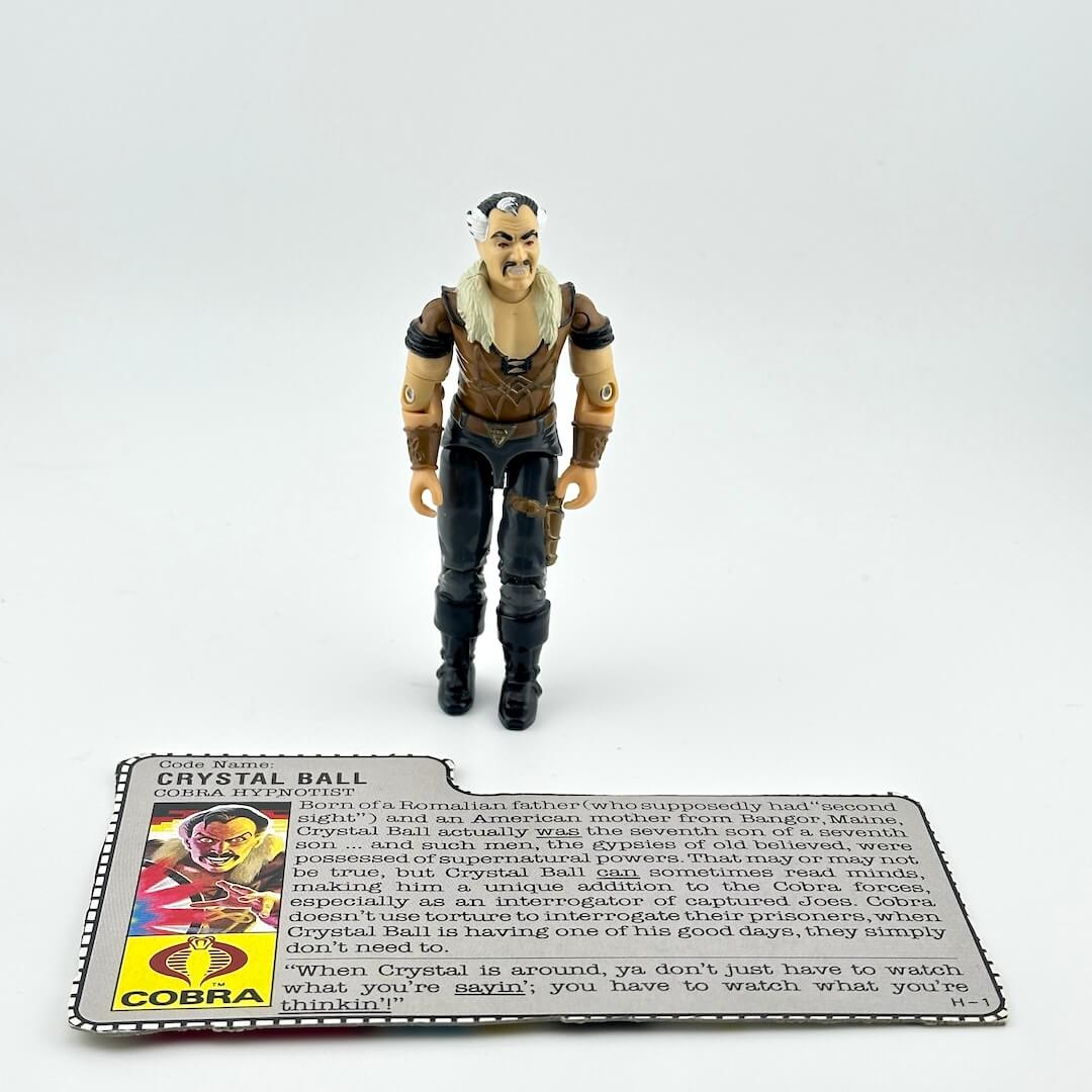 Action figure with a character card on a white background