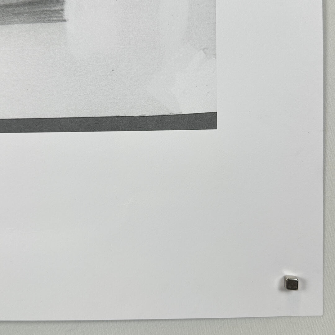 Bottom right corner of poster with no visible damage. 