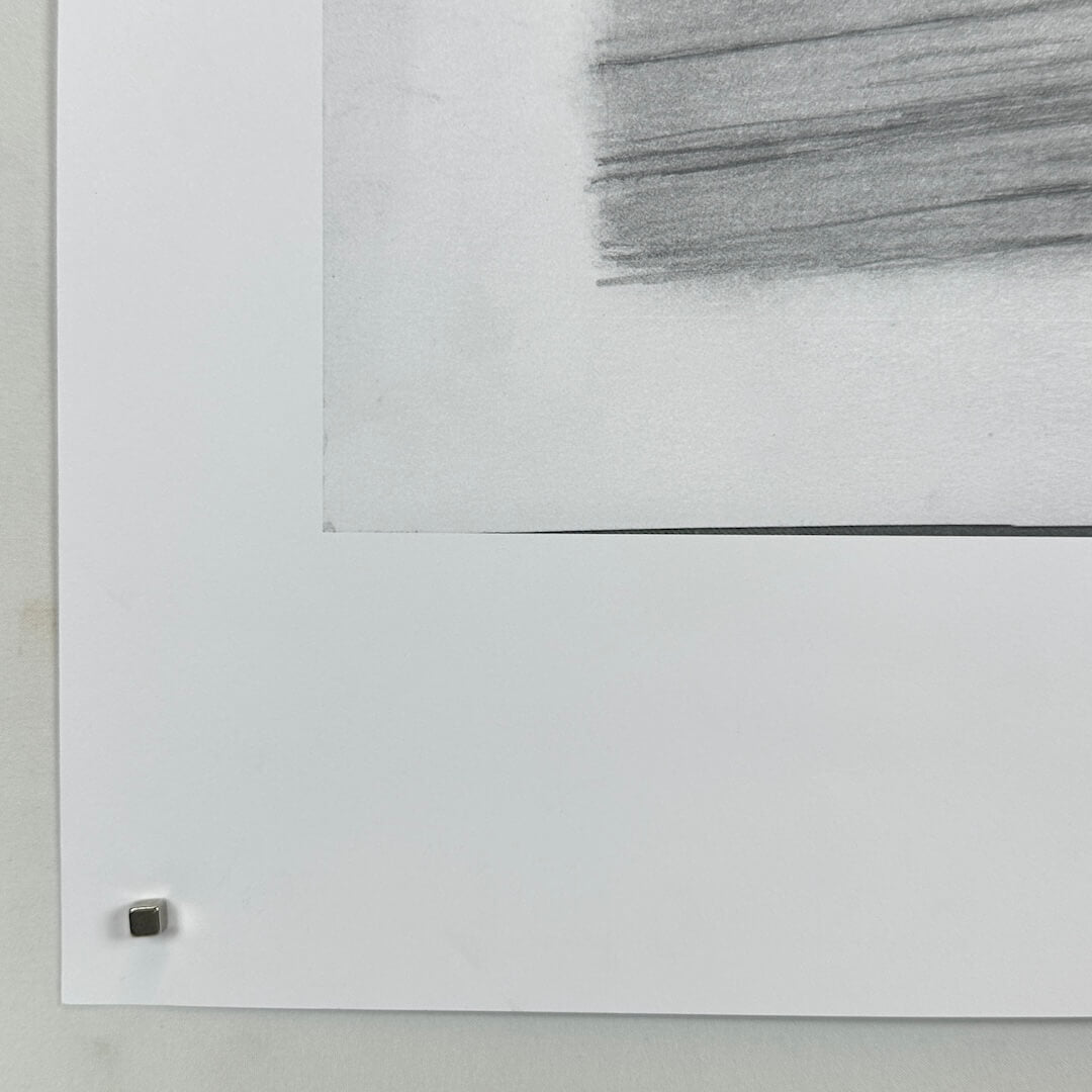 Bottom left corner of poster with no visible damage. 