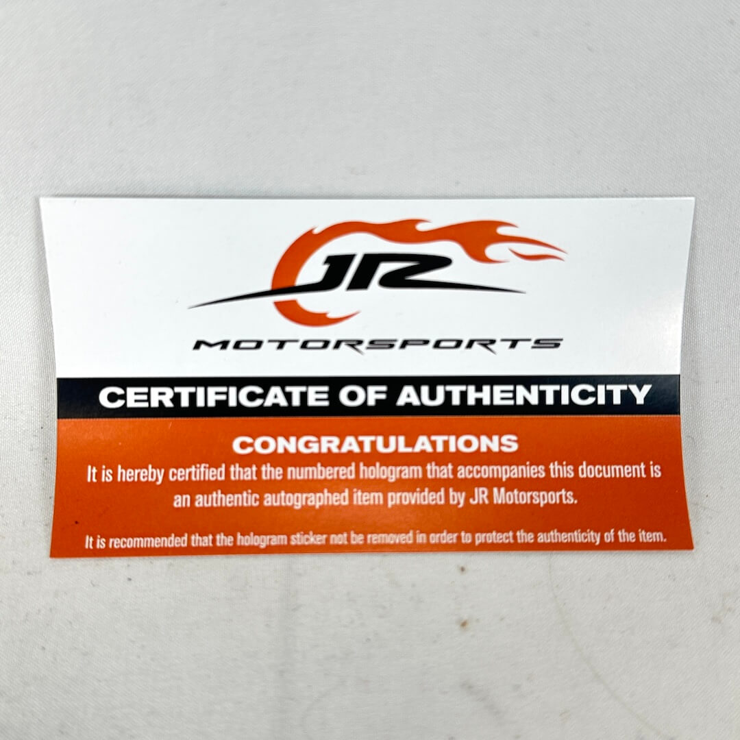 JR Motorsports Certificate of Authenticity on a gray background