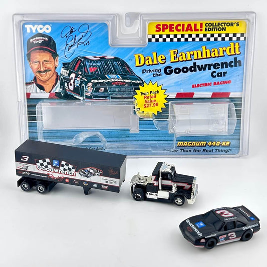 Tyco & NASCAR crossover slot car set against white background. 