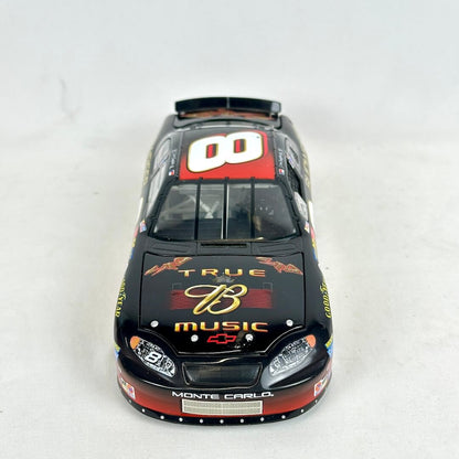 Model car with 'True Music' and other branding on a white background
