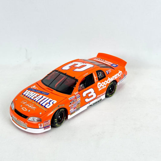 Model car with orange and white design on a white background