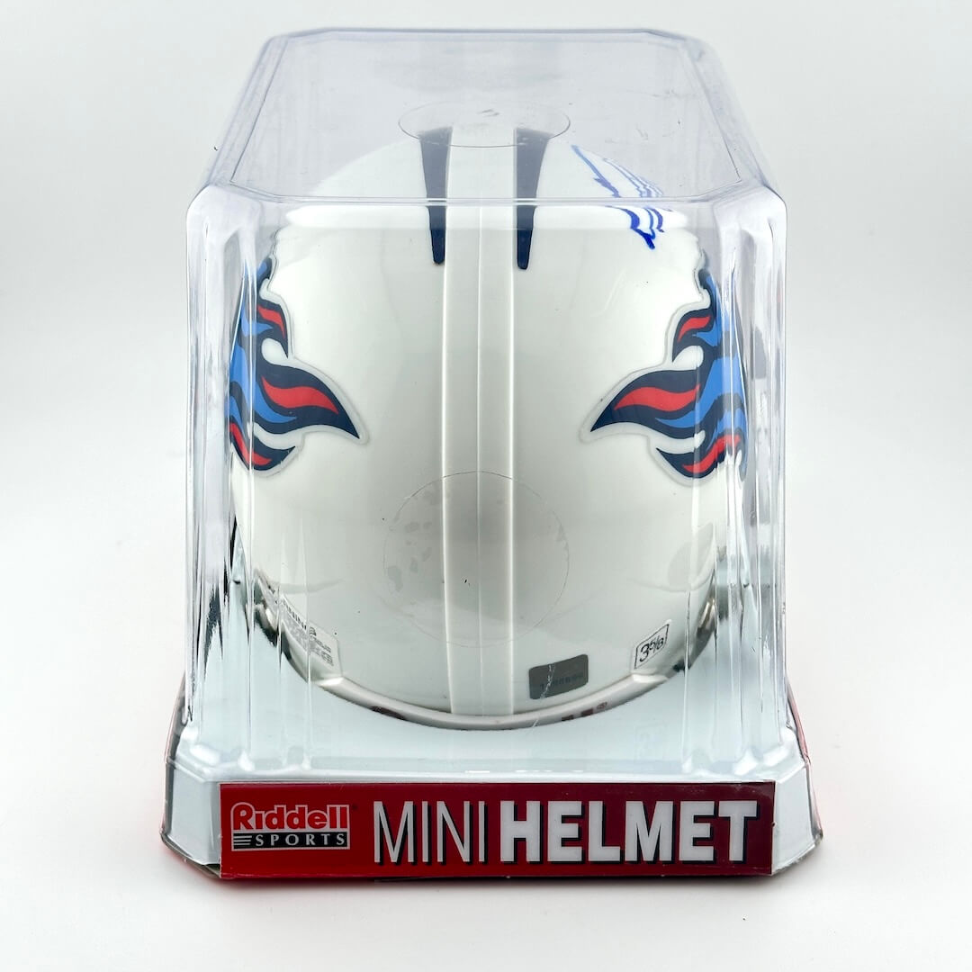 Riddell sports mini football helmet with Tennessee Titans logo in packaging on a white background